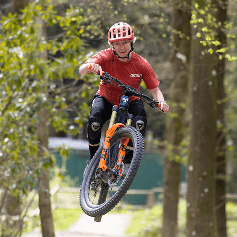 British female beatup downhill mountain bikers